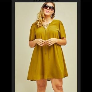 Shift dress featuring strappy self-tie closure.